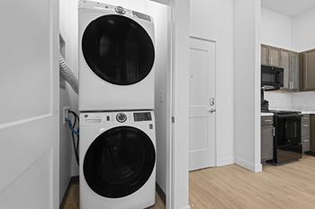 Front loading washing machine in a laundry room at 36N Apartments, Tulsa, OK